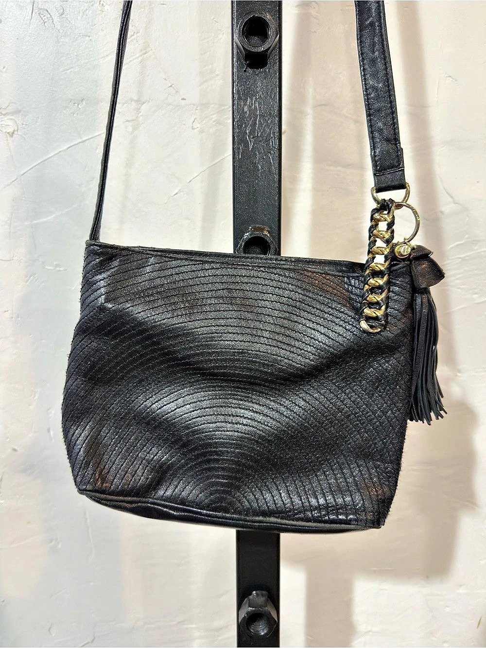 Paola del Lungo black leather crossbody bag